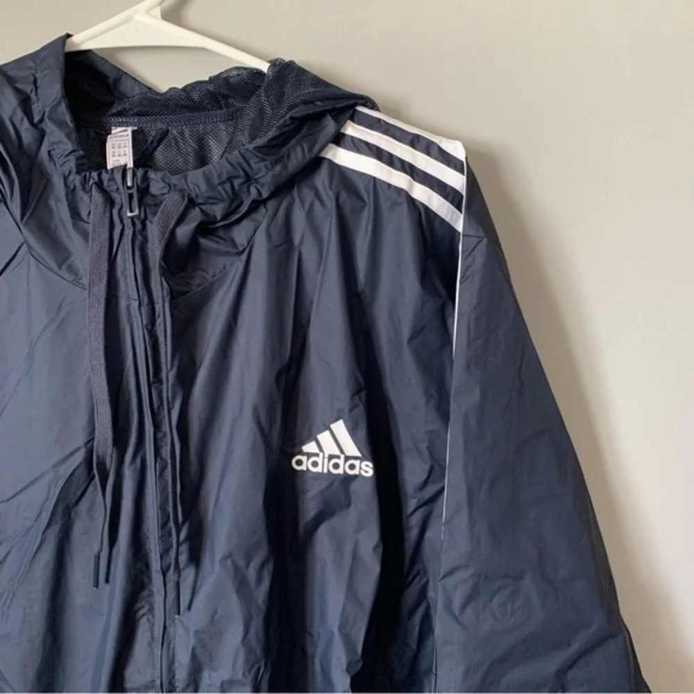 NWT. ADIDAS Primegreen Essentials 3-Stripes Men’s Windbreaker